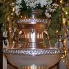 Our silver lighted punch fountain, we can customize the top centerpiece with your wedding colors or theme.