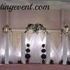 This is our Tulle cross backdrop.  It's beautiful up against a plain wall.  Lighting is included.