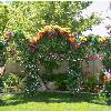 Triple Black Wrought Iron Arches with Greenery - Can be used both indoors and outdoors.