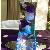 Tall glass Cylinder Centerpiece, can be used in many different ways.  We have 12 Glass Vases Available for Rent. - Tall glass cylinder and mirror ent for $10 each - Add floating silk flowers and lighting for an additional $5-$6 each depending on flower style.