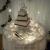 Lighted ruffle top cake table.
